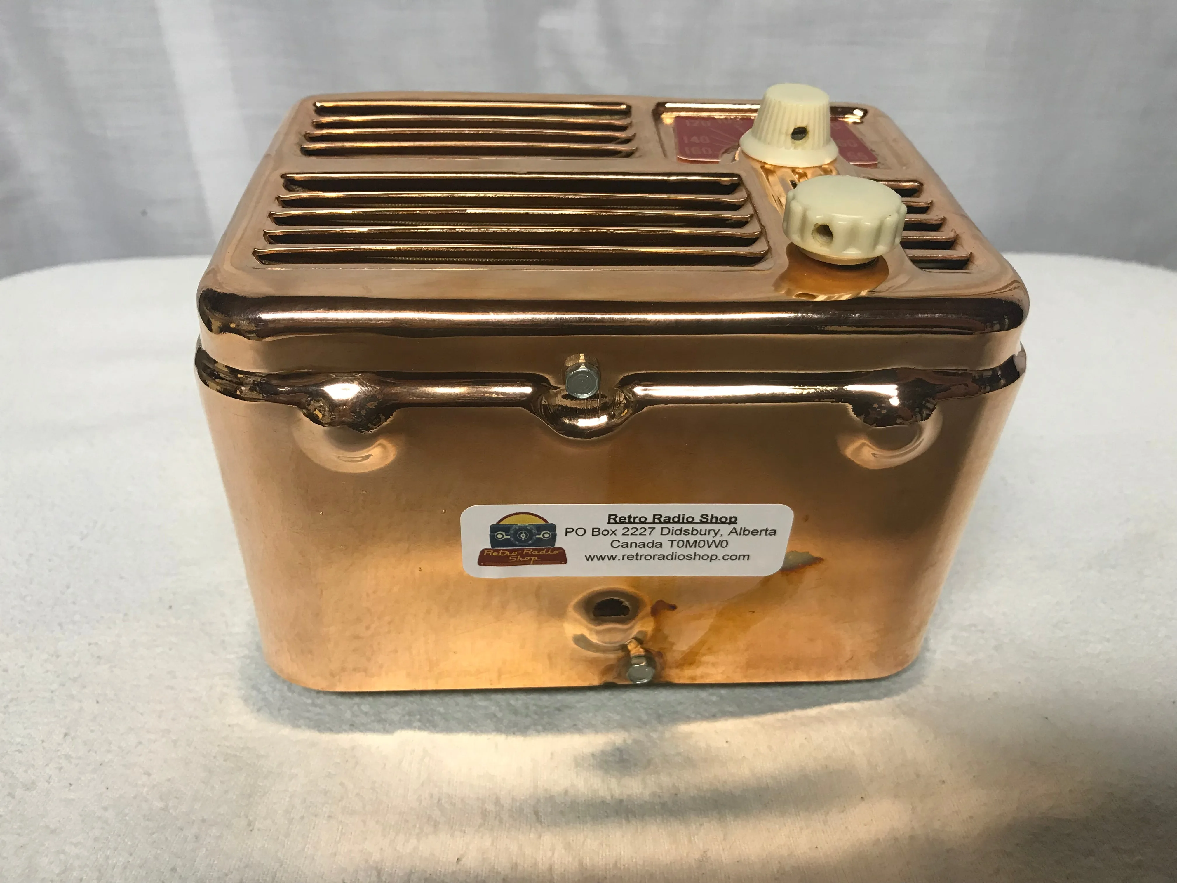 Copper Silvertone Midget Tube Radio With Bluetooth input.