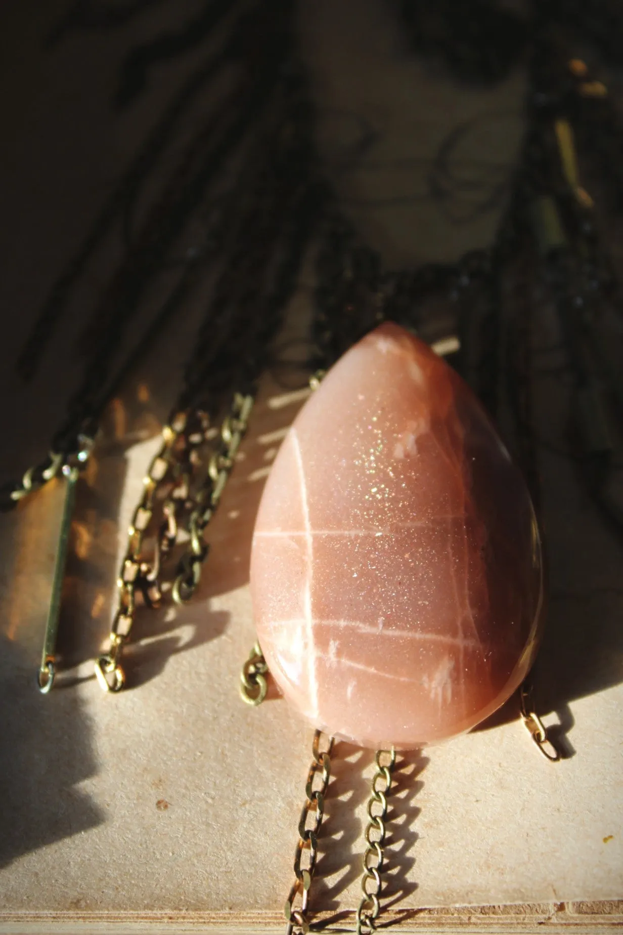Luminary II. Peach Moonstone & Brass Fringe Necklace.