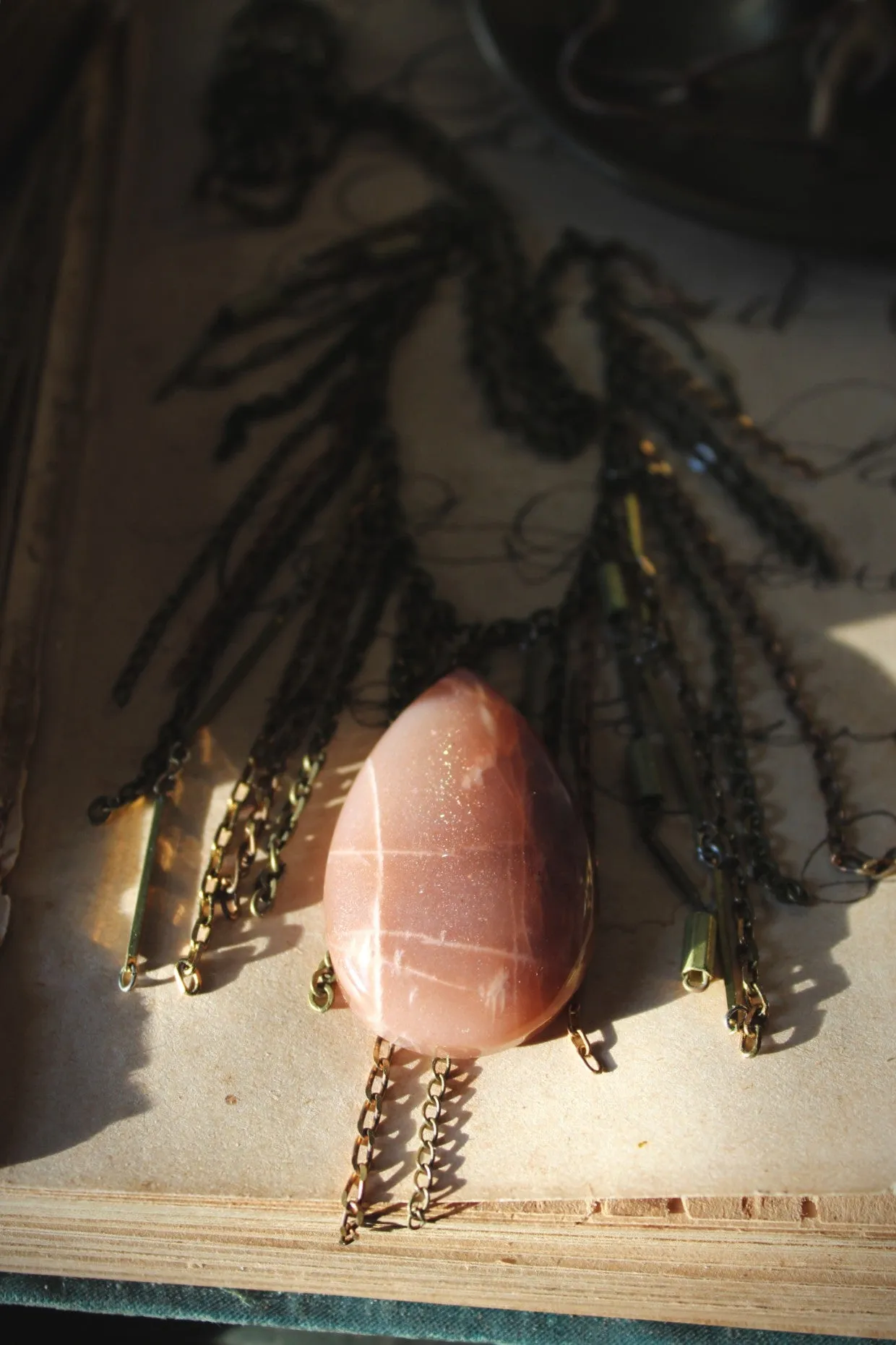 Luminary II. Peach Moonstone & Brass Fringe Necklace.