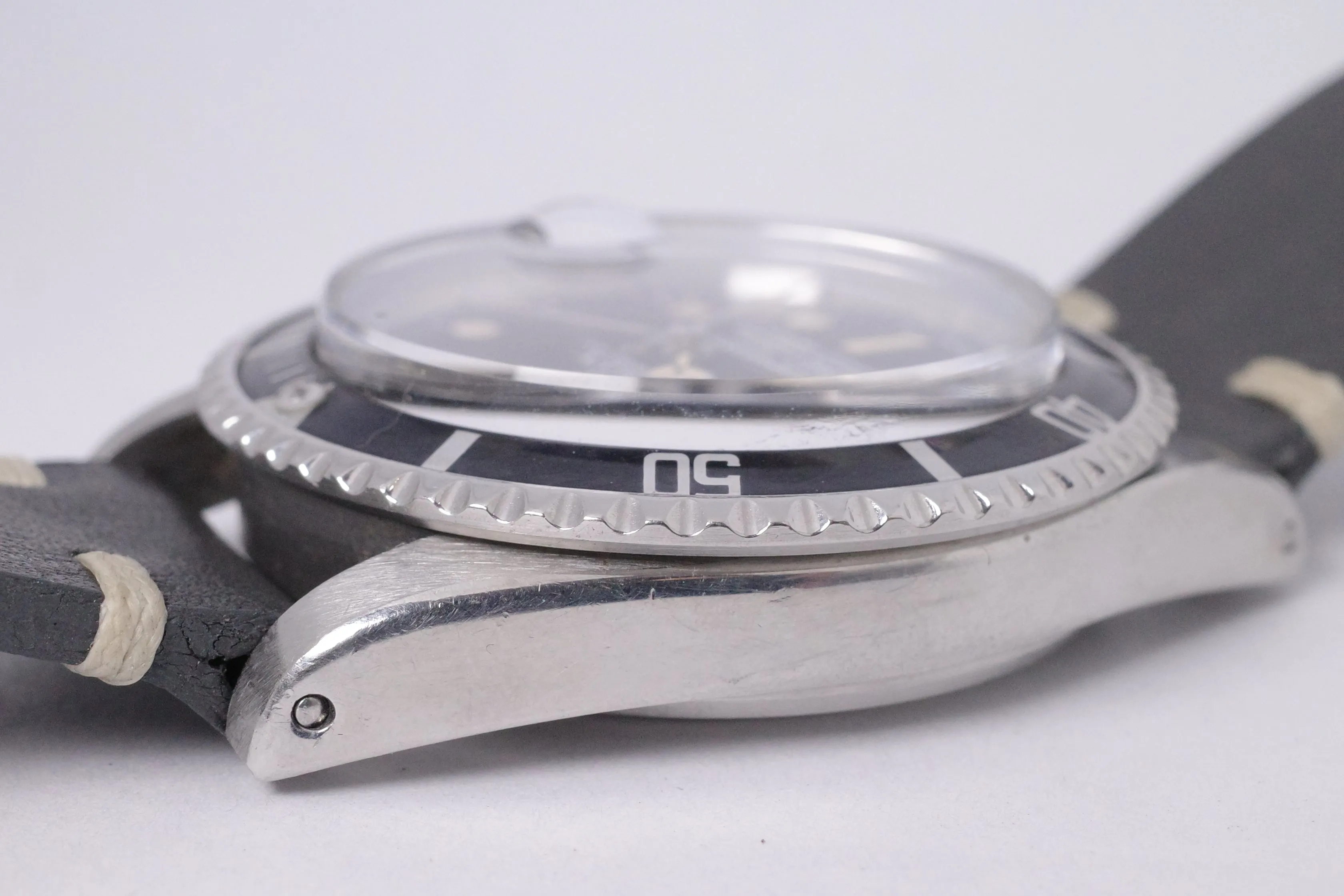 ROLEX VINTAGE DATE SUBMARINER 1680 WITH LIGHT BEIGE TONE PATINA ON STRAP $9,500