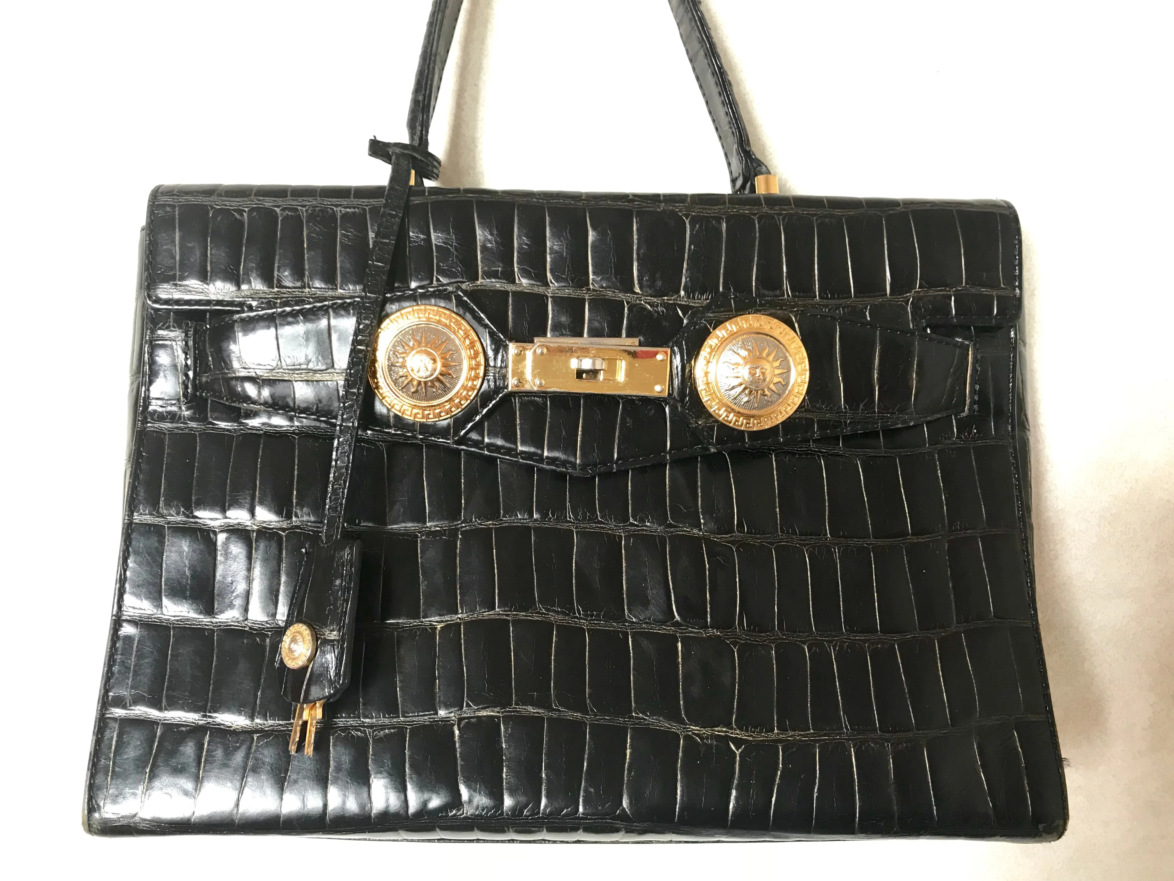 Vintage Gianni Versace black croc embossed leather Kelly style bag with Medallion Sunburst motifs. Gorgeous masterpiece. 050816f1
