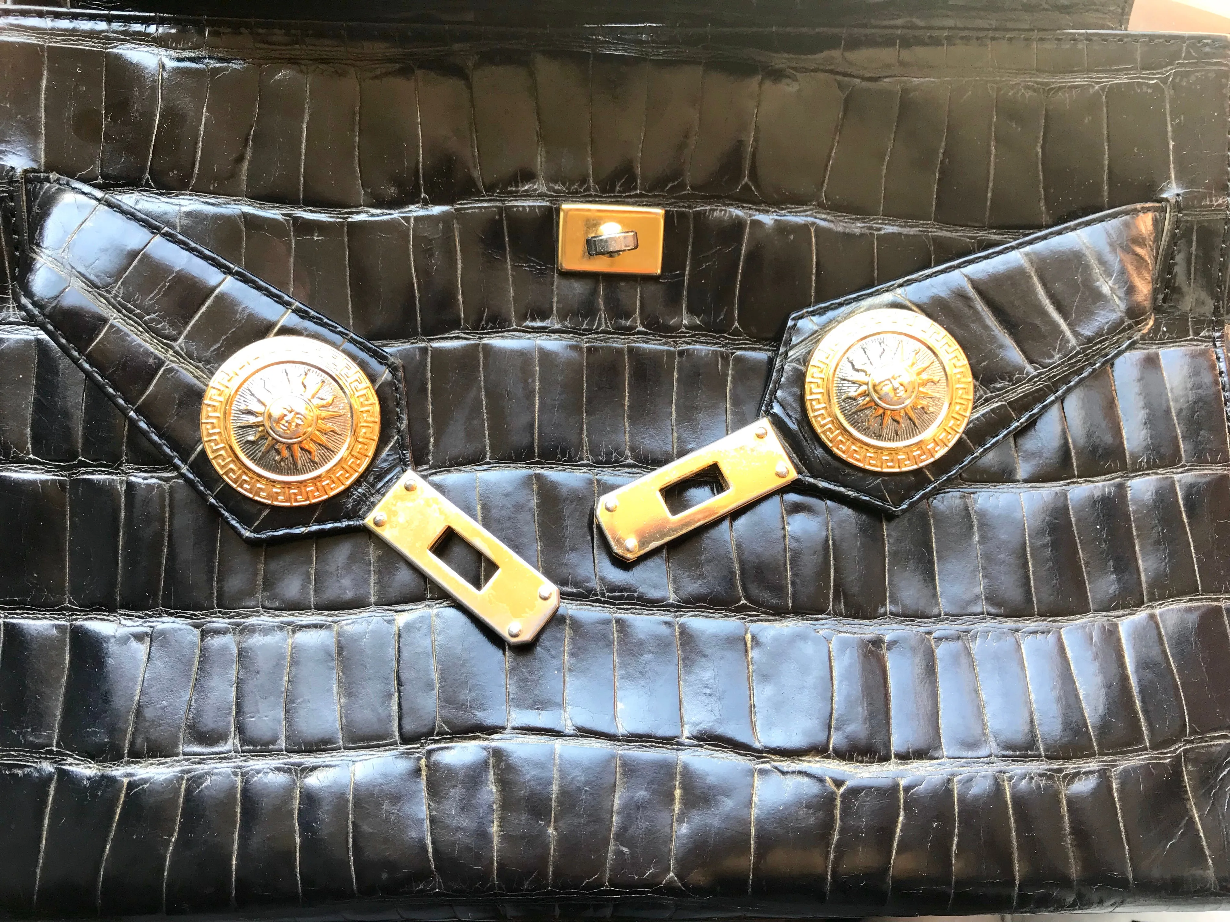 Vintage Gianni Versace black croc embossed leather Kelly style bag with Medallion Sunburst motifs. Gorgeous masterpiece. 050816f1