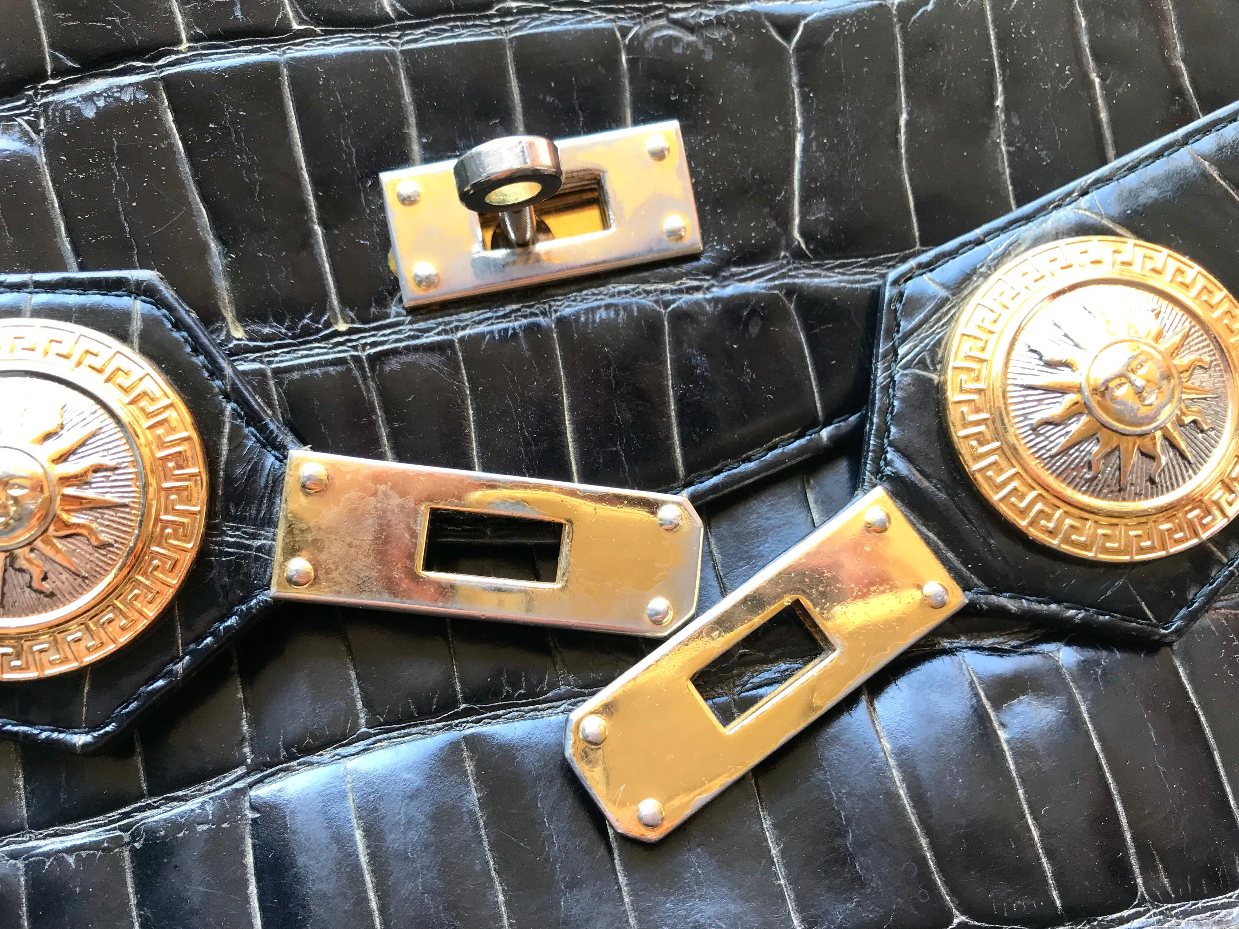 Vintage Gianni Versace black croc embossed leather Kelly style bag with Medallion Sunburst motifs. Gorgeous masterpiece. 050816f1