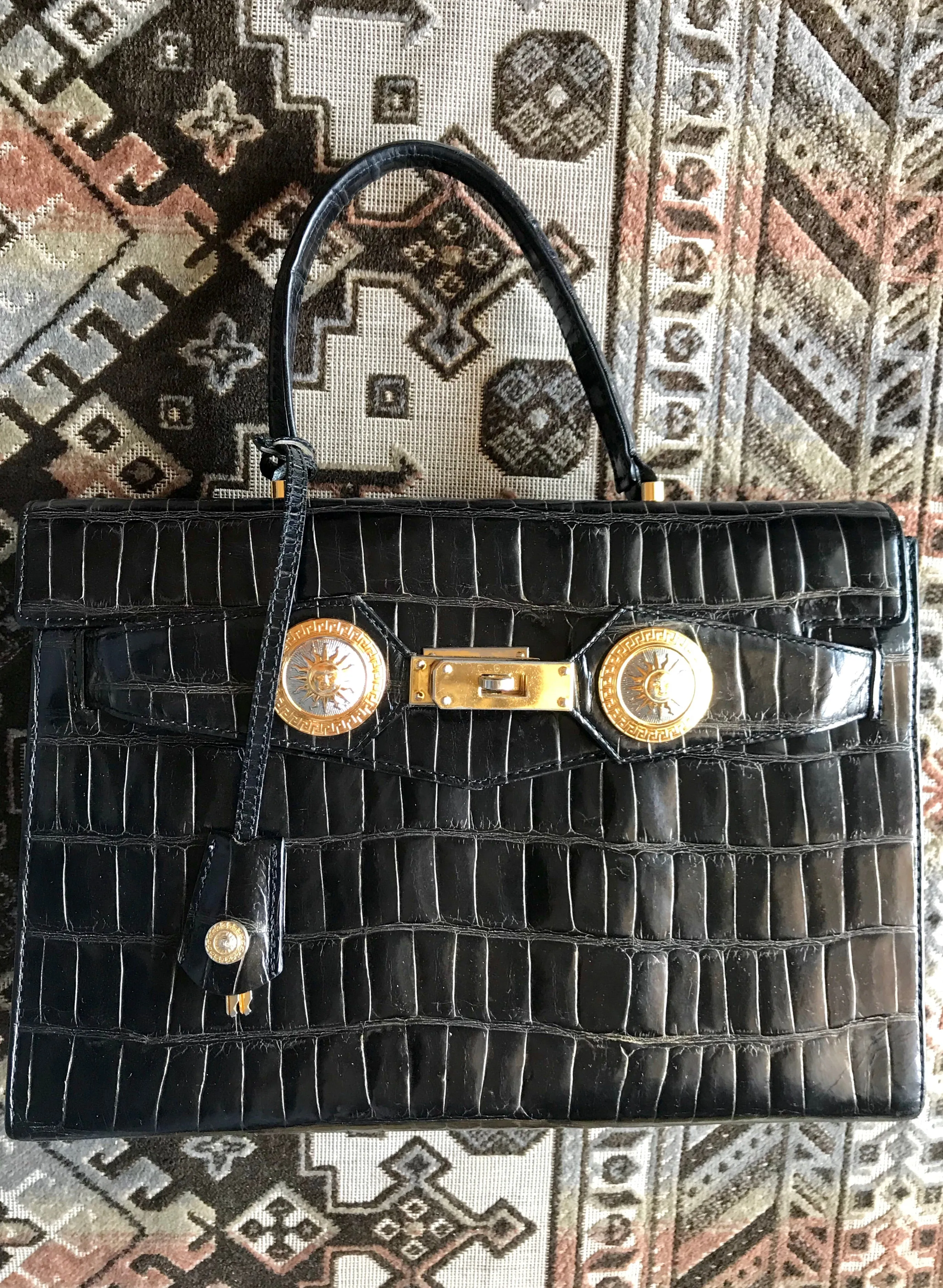 Vintage Gianni Versace black croc embossed leather Kelly style bag with Medallion Sunburst motifs. Gorgeous masterpiece. 050816f1