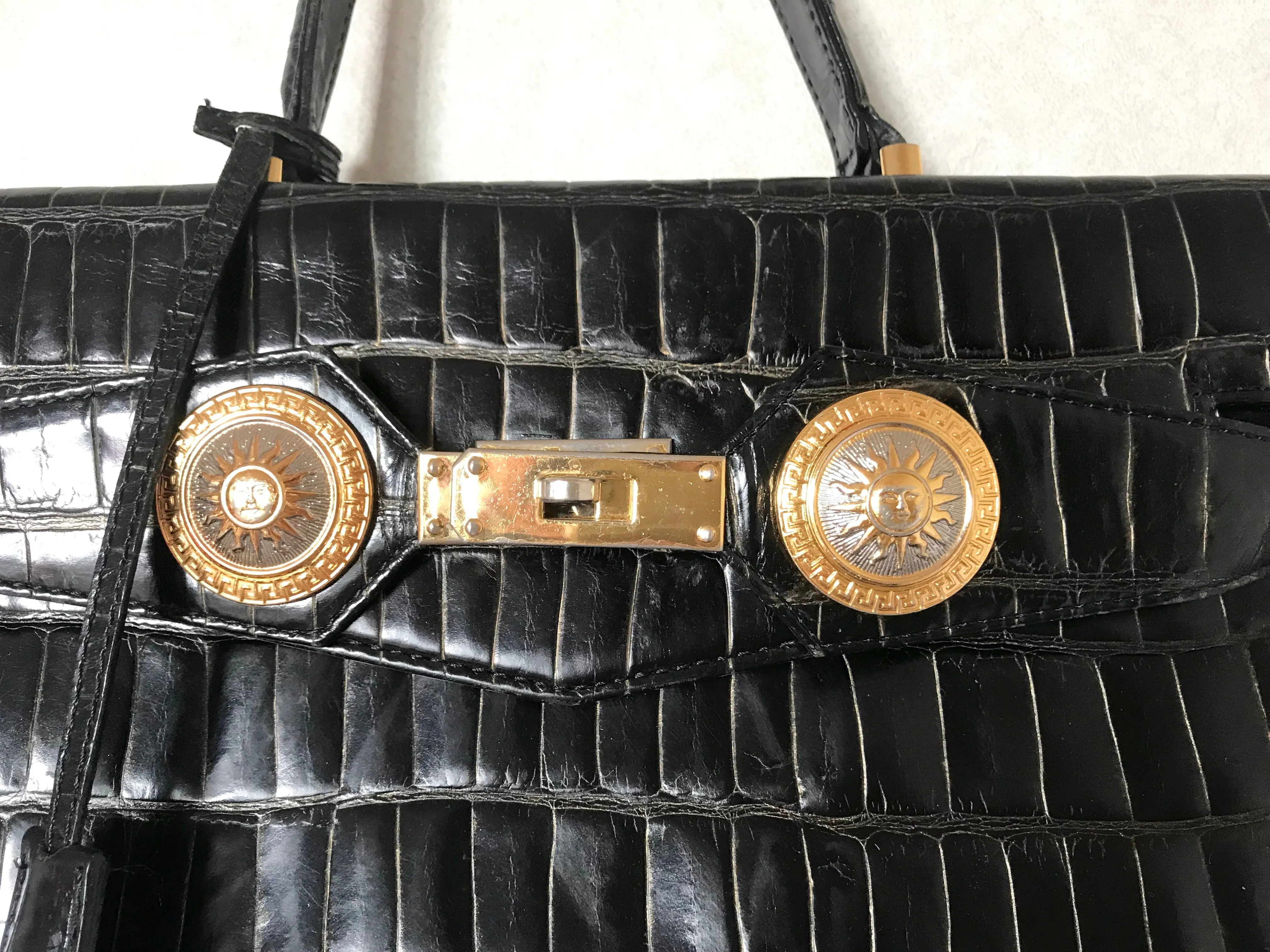 Vintage Gianni Versace black croc embossed leather Kelly style bag with Medallion Sunburst motifs. Gorgeous masterpiece. 050816f1