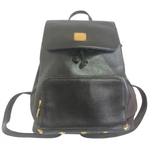 Vintage MCM black leather backpack with golden studded logo motifs. Designed by Michael Cromer. Unisex bag for daily use.