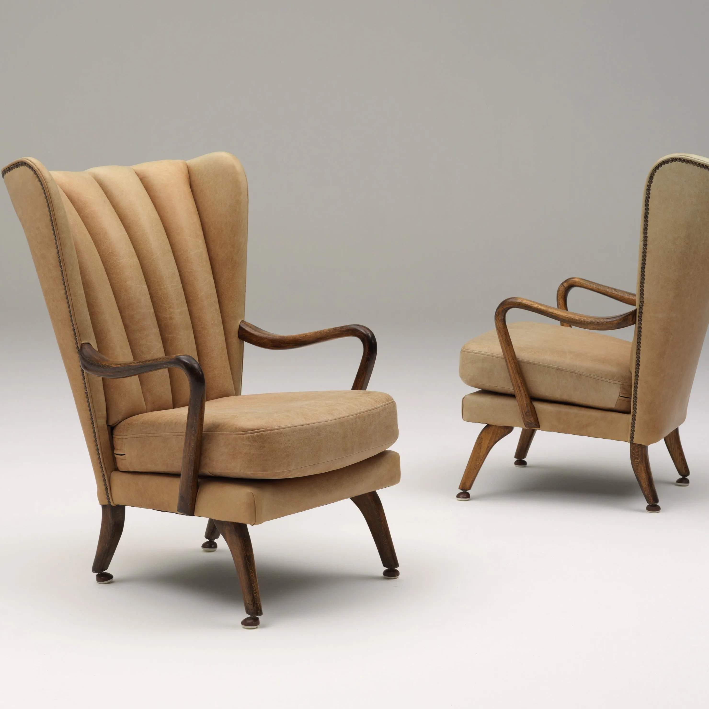 Vintage Wingback Leather Armchair - pair