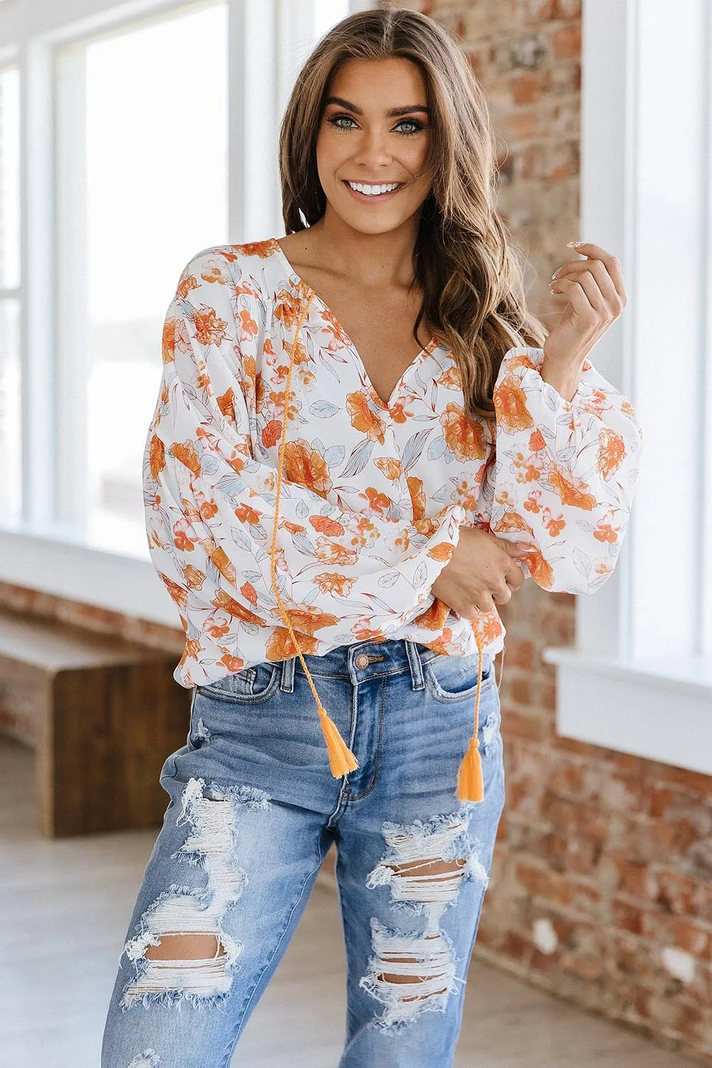 White Tassel Tie V Neck Bubble Sleeve Floral Blouse